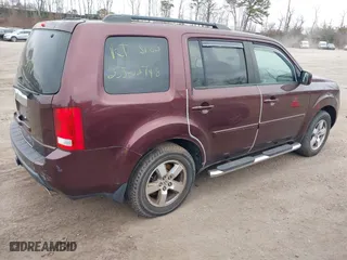2009 Honda Pilot EX-L with VIN 5FNYF48569B018445, listed as a IAAI auction lot 41808595 with 999,999 mi miles. Bid and sale history available at carsss.com. Image 4.