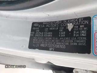 2005 Kia Sportage LX with VIN KNDJF723757087655, listed as a IAAI auction lot 41706354 with 164,736 mi miles and . Bid and sale history available at carsss.com. Image 9.
