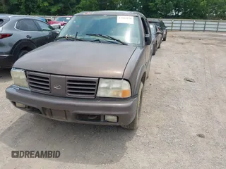 1999 Oldsmobile Bravada z VIN 1GHDT13W3X2710047, wystawiony jako IAAI lot #42481978 z przebiegiem Nie podano mil oraz . Historia ofert i sprzedaży dostępna na DreamBid. Obrazek 6.