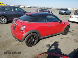 2012 MINI Cooper Coupe with VIN WMWSX1C5XCT163790, listed as a Copart auction lot 73148734 with 144,323 mi miles and Salvage Title. Bid and sale history available at carsss.com. Image 3.