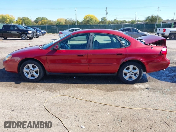 2003 Ford Taurus SE Standard with VIN 1FAFP53U53G212931, listed as a IAAI auction lot 40682539 with 138,547 mi miles. Bid and sale history available at carsss.com. Image 14.
