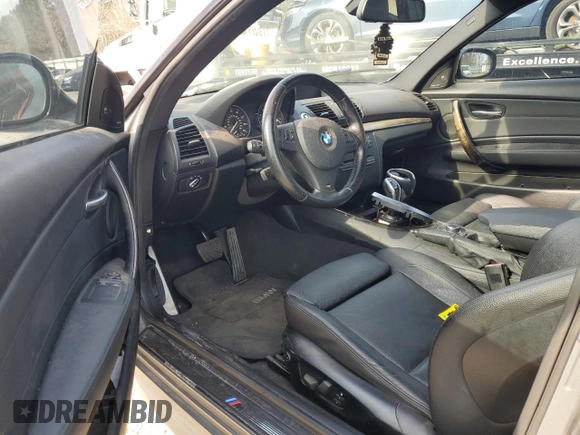 2012 BMW 1 Series 135i with VIN WBAUC9C56CVM12237, listed as a Copart auction lot 85595234 with Not provided miles and Salvage title. Bid and sale history available at DreamBid. Image 7.