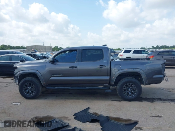 2021 Toyota Tacoma SR with VIN 3TYAX5GNXMT012484, listed as a IAAI auction lot 42429068 with 105,555 mi miles and . Bid and sale history available at DreamBid. Image 14.