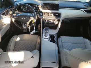 2023 Genesis G70 3.3T with VIN KMTG54TE1PU106881, listed as a Copart auction lot 83988384 with 70,698 mi miles and Salvage Title. Bid and sale history available at DreamBid. Image 8.