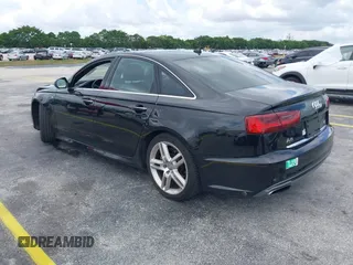2016 Audi A6 2.0T Premium Plus with VIN WAUGFAFC6GN055826, listed as a IAAI auction lot 42011778 with 98,210 mi miles. Bid and sale history available at carsss.com. Image 3.