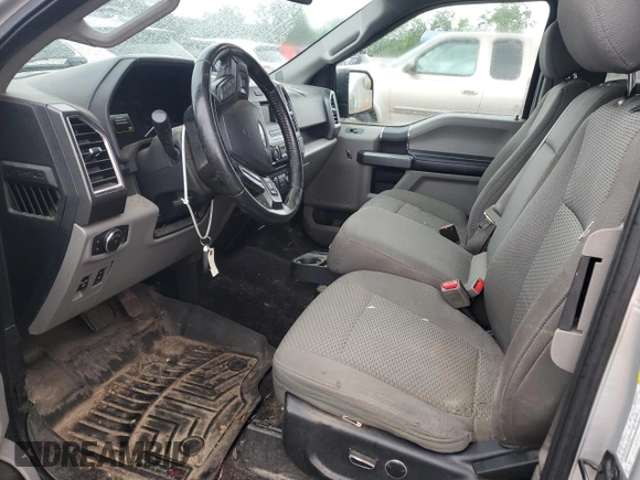 2015 Ford F-150 XLT with VIN 1FTEX1EP1FKF19892, listed as a Copart auction lot 57976715 with 179,507 mi miles and Salvage title. Bid and sale history available at DreamBid. Image 7.