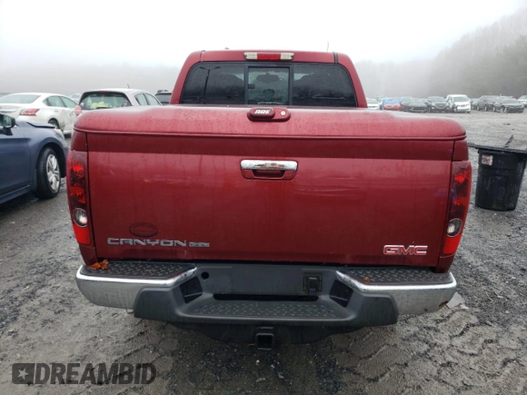 2010 GMC Canyon SLE1 with VIN 1GTJTCDE6A8108290, listed as a Copart auction lot 85456084 with 116,622 mi miles and Clean Title. Bid and sale history available at carsss.com. Image 6.