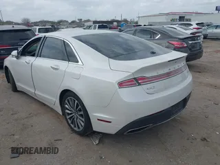2017 Lincoln MKZ Hybrid Premiere with VIN 3LN6L5KU8HR629821, listed as a IAAI auction lot 41746310 with 106,941 mi miles. Bid and sale history available at carsss.com. Image 3.