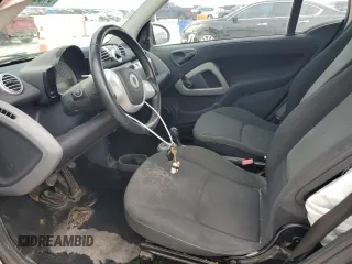 2013 Smart fortwo Pure with VIN WMEEJ3BA1DK633239, listed as a Copart auction lot 54829205 with 147,647 mi miles and Salvage Title. Bid and sale history available at carsss.com. Image 7.