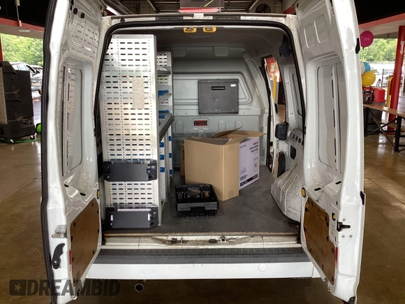 2013 Ford Transit Connect XLT z VIN NM0LS7BN2DT141131, wystawiony jako IAAI lot #42571503 z przebiegiem 151 903 mil mil oraz . Historia ofert i sprzedaży dostępna na DreamBid. Obrazek 32.