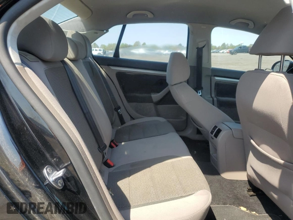 2010 Volkswagen Jetta S with VIN 3VWJX7AJ0AM010023, listed as a Copart auction lot 52379285 with 124,881 mi miles and Salvage title. Bid and sale history available at DreamBid. Image 10.