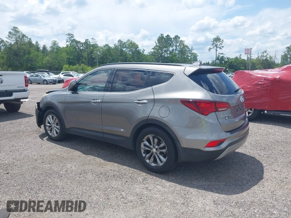2018 Hyundai Santa Fe 2.0T с VIN 5NMZU4LAXJH057363, выставлен на аукционе IAAI как лот 42265981 с пробегом 118 536 миль миль и . История ставок и продаж доступна на DreamBid. Изображение 3.