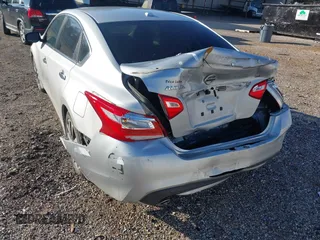 2016 Nissan Altima S with VIN 1N4AL3APXGC288696, listed as a IAAI auction lot 41209580 with 131,709 mi miles and . Bid and sale history available at carsss.com. Image 6.