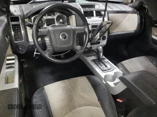 2010 Mercury Mariner Premier z VIN 4M2CN8H70AKJ18368, wystawiony jako Copart lot #85695854 z przebiegiem 183 194 mil mil oraz Nie do naprawy • Non repairable. Historia ofert i sprzedaży dostępna na DreamBid. Obrazek 8.