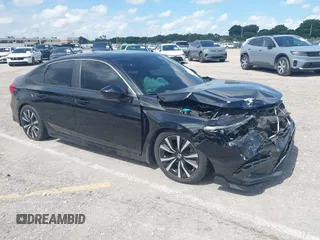 2022 Honda Civic EX with VIN JHMFE1F76NX007392, listed as a IAAI auction lot 42526880 with 54,203 mi miles and . Bid and sale history available at DreamBid. Image 1.