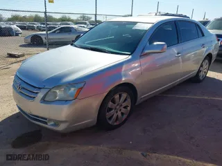2007 Toyota Avalon XL with VIN 4T1BK36B77U224202, listed as a IAAI auction lot 41483068 with 252,735 mi miles. Bid and sale history available at carsss.com. Image 2.