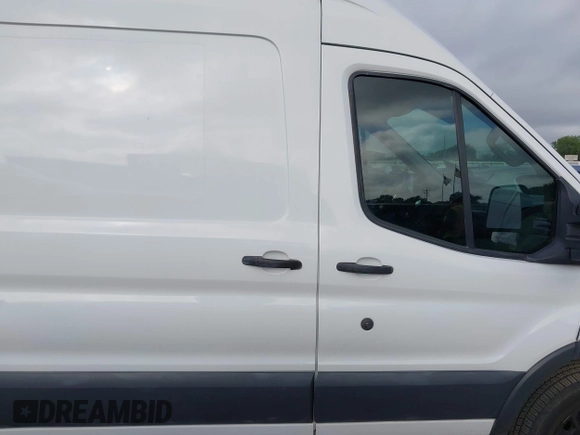 2015 Ford Transit z VIN 1FTSW2XM2FKA02969, wystawiony jako IAAI lot #42515290 z przebiegiem 166 292 mil mil oraz . Historia ofert i sprzedaży dostępna na DreamBid. Obrazek 12.