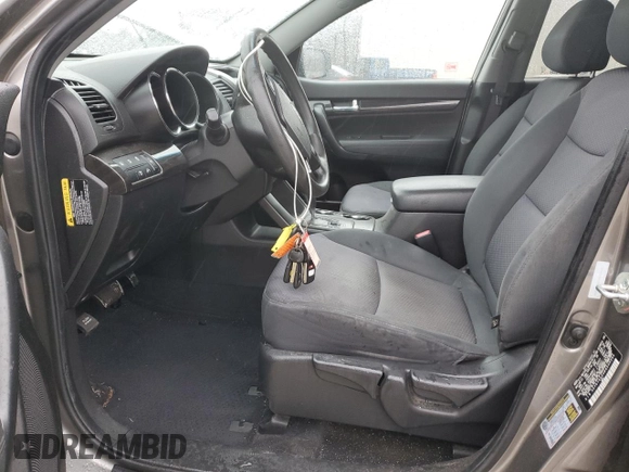 2013 Kia Sorento LX with VIN 5XYKT4A20DG330244, listed as a Copart auction lot 50123075 with 64,959 mi miles and Salvage Title. Bid and sale history available at carsss.com. Image 7.