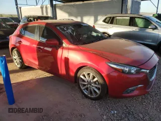 2017 Mazda 3 Grand Touring with VIN JM1BN1M38H1133437, listed as a Copart auction lot 80991974 with 73,810 mi miles and Salvage Title. Bid and sale history available at DreamBid. Image 4.