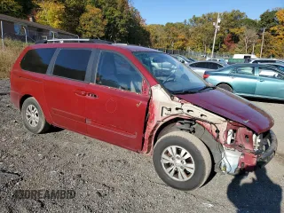 2012 Kia Sedona LX with VIN KNDMG4C77C6503605, listed as a Copart auction lot 77481894 with 103,026 mi miles and Salvage Title. Bid and sale history available at carsss.com. Image 4.