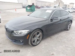 2016 BMW 4 Series 428i with VIN WBA4A9C51GG506512, listed as a IAAI auction lot 41940754 with 144,999 mi miles and . Bid and sale history available at DreamBid. Image 2.