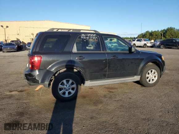 2011 Mazda Tribute Touring with VIN 4F2CY0C70BKM02624, listed as a Copart auction lot 75472464 with 172,077 mi miles and Salvage Title. Bid and sale history available at carsss.com. Image 3.