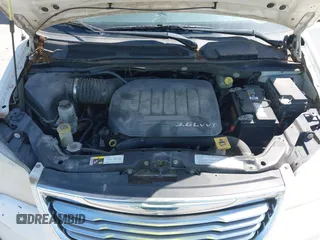 2013 Chrysler Town & Country Touring with VIN 2C4RC1BG0DR585138, listed as a IAAI auction lot 42186087 with 205,152 mi miles and . Bid and sale history available at DreamBid. Image 10.