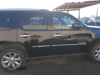 2013 GMC Yukon Denali with VIN 1GKS2EEF9DR208591, listed as a IAAI auction lot 41802138 with 160,371 mi miles. Bid and sale history available at carsss.com. Image 14.