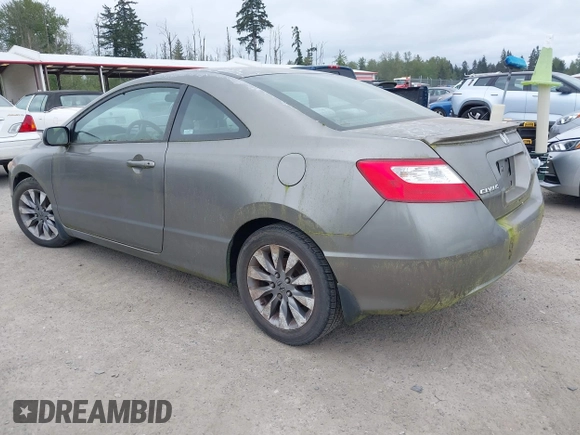 2007 Honda Civic Cpe EX with VIN 2HGFG12817H516082, listed as a IAAI auction lot 42142797 with 170,442 mi miles. Bid and sale history available at carsss.com. Image 3.