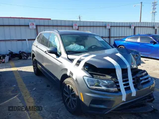 2020 Volkswagen Tiguan SE with VIN 3VV2B7AX5LM068627, listed as a IAAI auction lot 41590858 with 81,020 mi miles and . Bid and sale history available at DreamBid. Image 1.