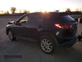2014 Mazda CX-5 Grand Touring with VIN JM3KE4DY9E0366667, listed as a Copart auction lot 88707365 with 140,115 mi miles and Salvage Title. Bid and sale history available at carsss.com. Image 2.