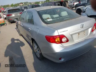 2009 Toyota Corolla with VIN 1NXBU40E59Z078727, listed as a IAAI auction lot 42035739 with 113,814 mi miles. Bid and sale history available at carsss.com. Image 3.