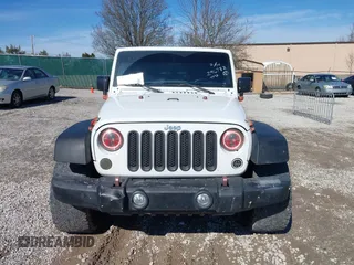 2016 Jeep Wrangler Unlimited Rubicon Hard Rock with VIN 1C4HJWFG9GL296782, listed as a IAAI auction lot 41595273 with 113,338 mi miles. Bid and sale history available at carsss.com. Image 12.