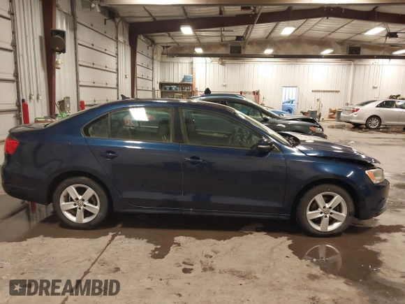 2012 Volkswagen Jetta Sedan TDI with VIN 3VW3L7AJ8CM378733, listed as a IAAI auction lot 41571197 with 151,159 mi miles. Bid and sale history available at carsss.com. Image 13.