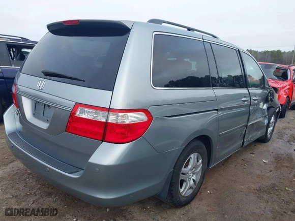 2007 Honda Odyssey EX-L with VIN 5FNRL38687B042064, listed as a IAAI auction lot 41468860 with 199,688 mi miles. Bid and sale history available at carsss.com. Image 4.