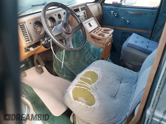 1991 GMC Vandura z VIN 1GDEG25K6M7504729, wystawiony jako Copart lot #71146614 z przebiegiem 181 800 mil mil oraz Tytuł czysty. Historia ofert i sprzedaży dostępna na DreamBid. Obrazek 8.