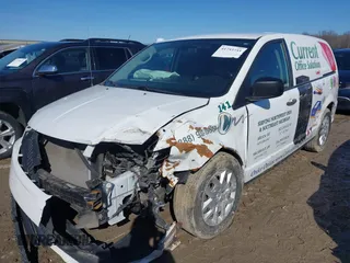 2014 Ram Cargo Van Tradesman with VIN 2C4JRGAGXER372764, listed as a IAAI auction lot 41753733 with 160,689 mi miles. Bid and sale history available at carsss.com. Image 2.