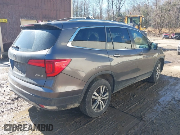 2017 Honda Pilot EX-L z VIN 5FNYF6H63HB027591, wystawiony jako IAAI lot #41854366 z przebiegiem 113 178 mil mil oraz . Historia ofert i sprzedaży dostępna na DreamBid. Obrazek 4.
