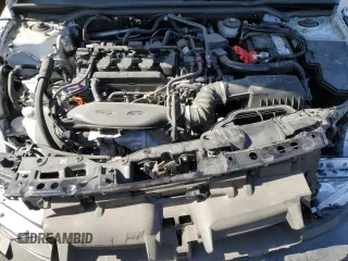 2023 Honda Civic Touring z VIN 2HGFE1F95PH314838, wystawiony jako Copart lot #52545085 z przebiegiem 29 863 mil mil oraz Szkoda całkowita • Salvage title. Historia ofert i sprzedaży dostępna na DreamBid. Obrazek 11.