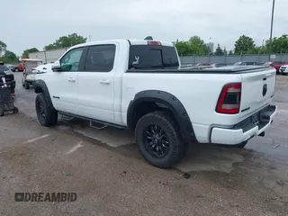 2020 Ram 1500 Big Horn with VIN 1C6SRFFT0LN105011, listed as a IAAI auction lot 42512812 with 71,825 mi miles and . Bid and sale history available at DreamBid. Image 3.