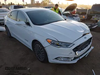 2018 Ford Fusion Titanium with VIN 3FA6P0RU9JR111570, listed as a IAAI auction lot 41338218 with 94,973 mi miles and . Bid and sale history available at DreamBid. Image 1.
