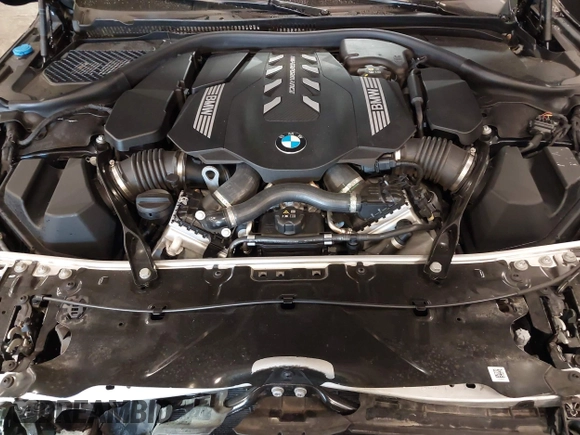 2023 BMW 8 Series with VIN WBAFY4C01PCM52812, listed as a IAAI auction lot 41967777 with 12,490 mi miles and . Bid and sale history available at DreamBid. Image 10.