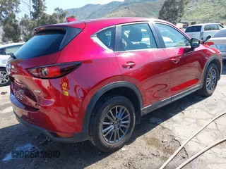 2019 Mazda CX-5 Sport with VIN JM3KFABM0K1633065, listed as a IAAI auction lot 41968786 with 90,407 mi miles and . Bid and sale history available at DreamBid. Image 4.