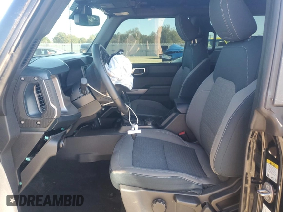 2023 Ford Bronco with VIN 1FMDE5BHXPLA82939, listed as a Copart auction lot 81402454 with 23,392 mi miles and Salvage Title. Bid and sale history available at DreamBid. Image 7.