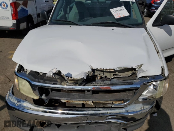 2002 Ford F-150 XL with VIN 1FTRF17W92NB42259, listed as a Copart auction lot 52986475 with 117,746 mi miles and Salvage title. Bid and sale history available at DreamBid. Image 11.
