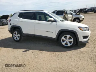 2019 Jeep Compass Latitude z VIN 3C4NJDBB4KT704264, wystawiony jako Copart lot #56062825 z przebiegiem 59 078 mil mil oraz Szkoda całkowita • Salvage title. Historia ofert i sprzedaży dostępna na DreamBid. Obrazek 4.