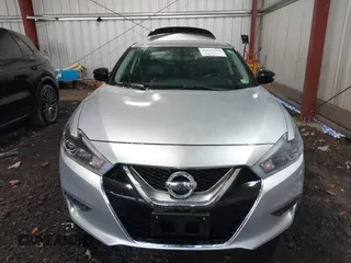 2016 Nissan Maxima SV with VIN 1N4AA6AP4GC443038, listed as a IAAI auction lot 40810384 with 134,955 mi miles and . Bid and sale history available at DreamBid. Image 12.
