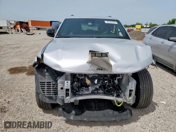 2024 Jeep Grand Cherokee Laredo X with VIN 1C4RJGAG2RC243586, listed as a Copart auction lot 56725245 with 10,735 mi miles and Salvage title. Bid and sale history available at DreamBid. Image 5.