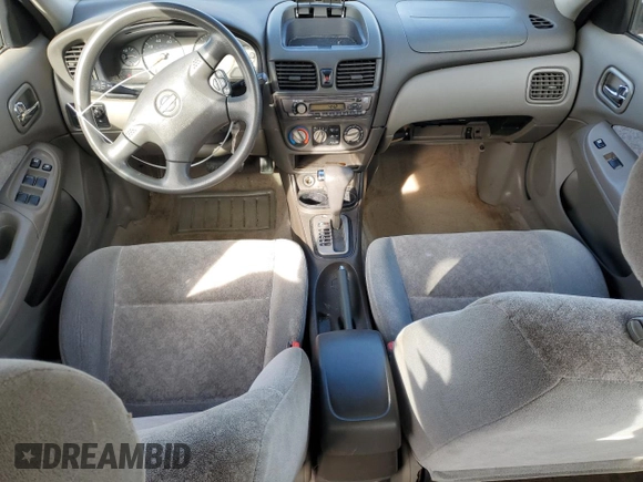 2001 Nissan Sentra GXE z VIN 3N1CB51D51L514813, wystawiony jako Copart lot #49574495 z przebiegiem 93 849 mil mil oraz Szkoda całkowita • Salvage title. Historia ofert i sprzedaży dostępna na DreamBid. Obrazek 8.