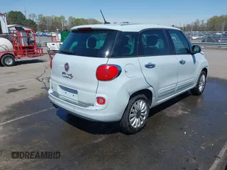 2015 FIAT 500L Easy with VIN ZFBCFABH8FZ031234, listed as a IAAI auction lot 41870102 with 86,267 mi miles and . Bid and sale history available at DreamBid. Image 4.